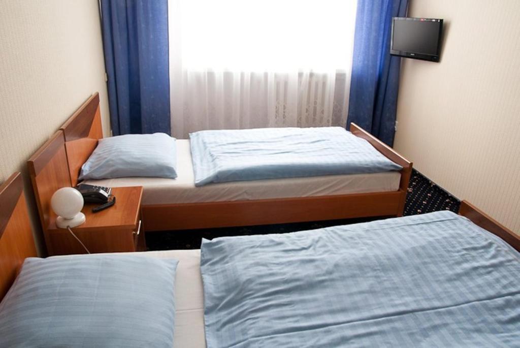 Hotel Naramowice Poznań Quarto foto